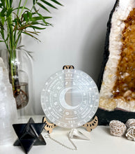 Load image into Gallery viewer, Crescent Moon Selenite Pendulum | Spirit board on large selenite charging plate
