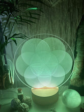Load image into Gallery viewer, Variation of Flower of life vibrational layers - Small wooden led light base - universal usb connections

