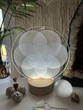 Load image into Gallery viewer, Variation of Flower of life vibrational layers - Small wooden led light base - universal usb connections
