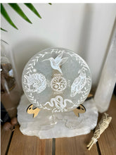 Load image into Gallery viewer, Shamanic 4 directions humming bird, eagle, serpent, jaguar- on large 14cm selenite charging plate optional stand
